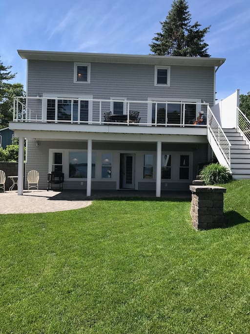 large deck and covered sitting area
