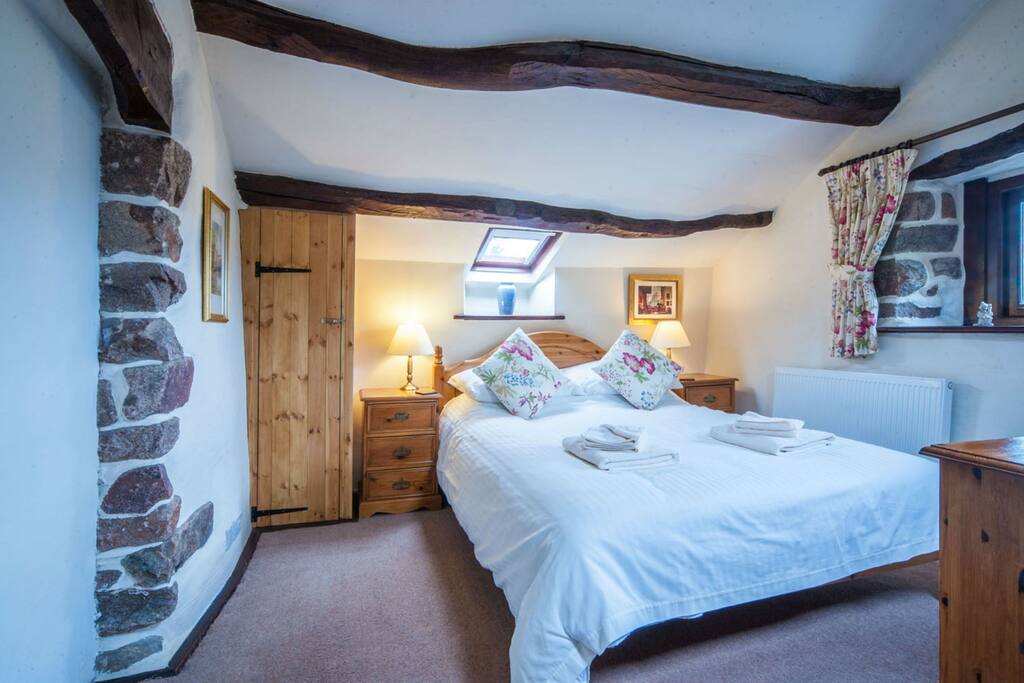 Upstairs bedroom with king size bed