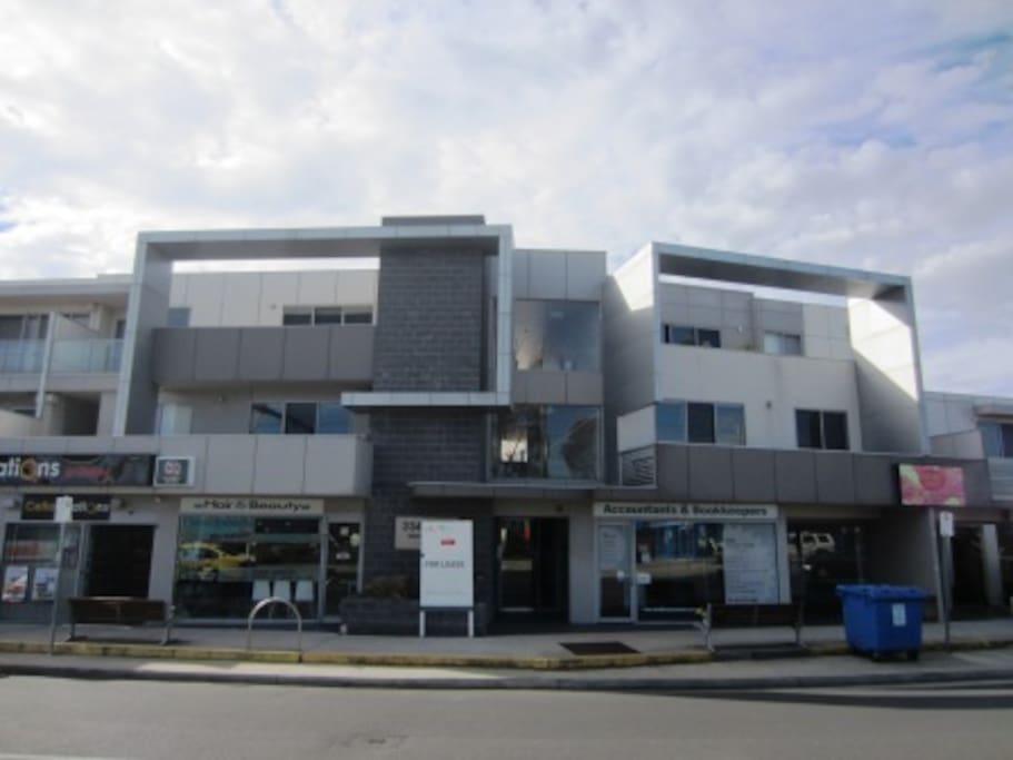 right across from train station, bus stop & all amenities.