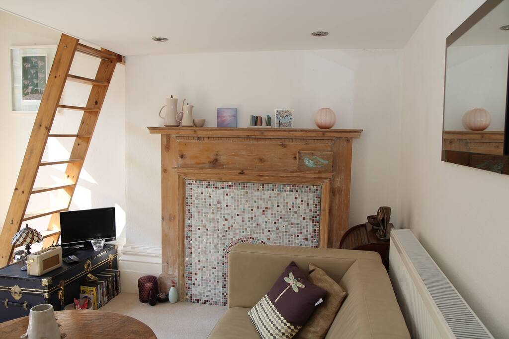 The lounge with ladder leading to the bed deck