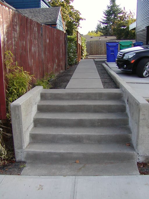 Easy to locate, illuminated stairway leads you to guest house door. Just follow the path.