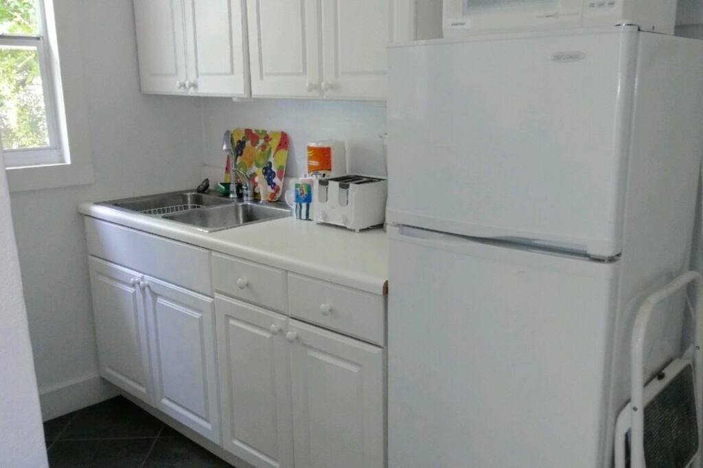 Windowed Kitchen with Large Toaster Oven, Microwave and Coffee Maker