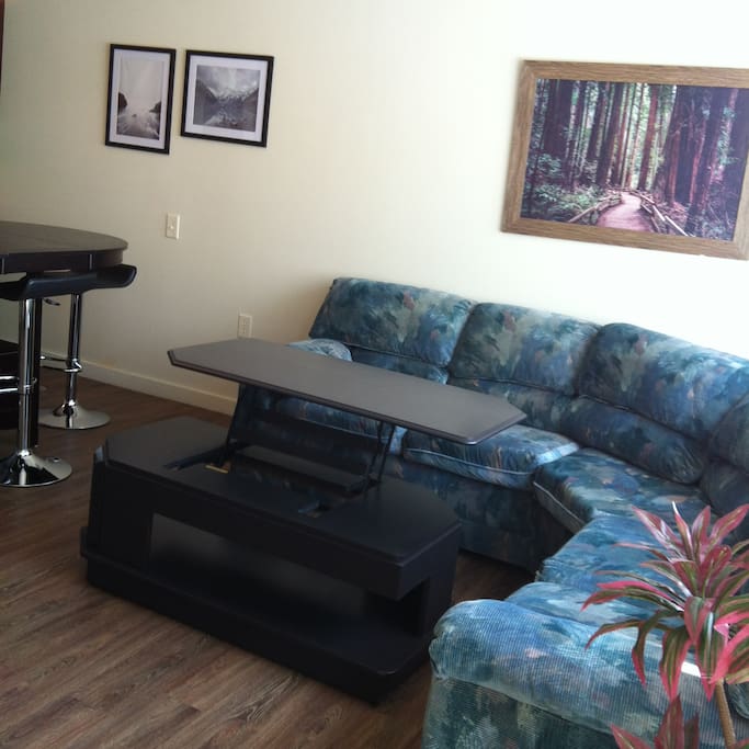 Living area with large couch and coffee table