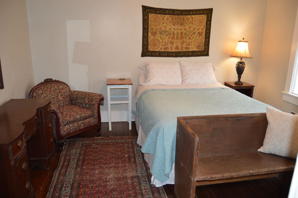 Relax and don’t mind being lazy in this plush queen size bed accented by hand made tapestry I brought back from Afghanistan. Use the old yellow poplar church bench to place your luggage on, or have a seat to take your shoes off and stay a while.