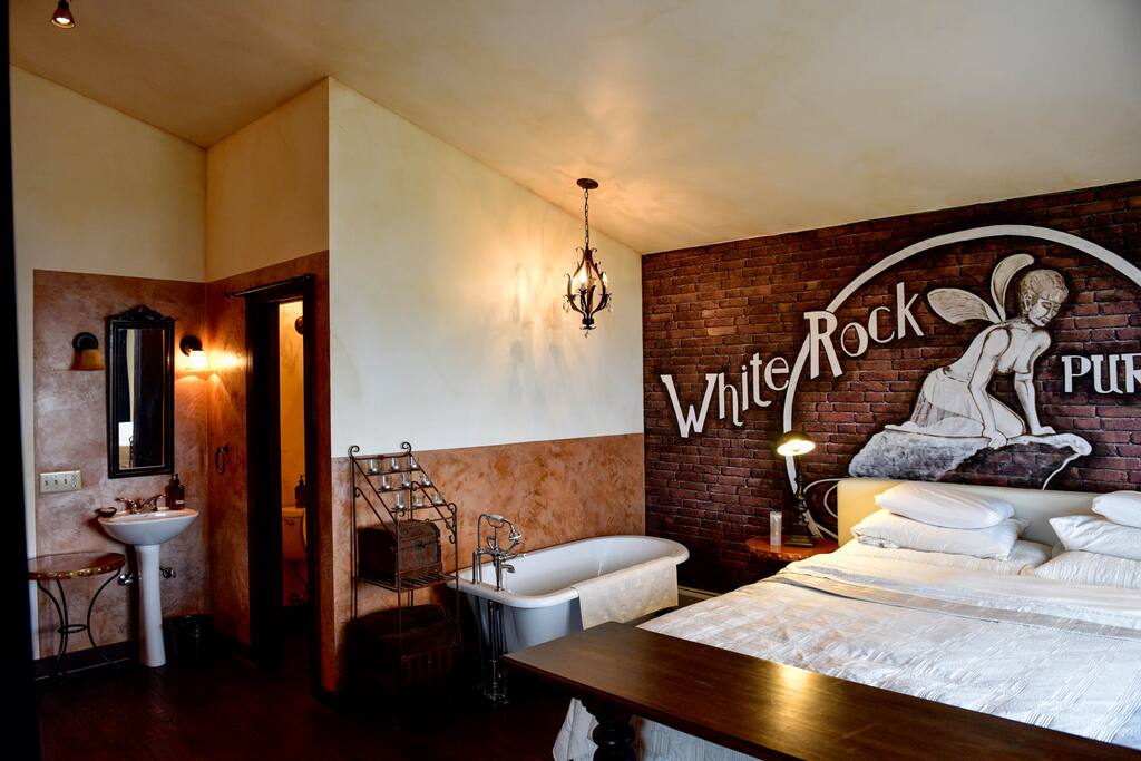 Master bedroom has en suite four claw tub and water closet.