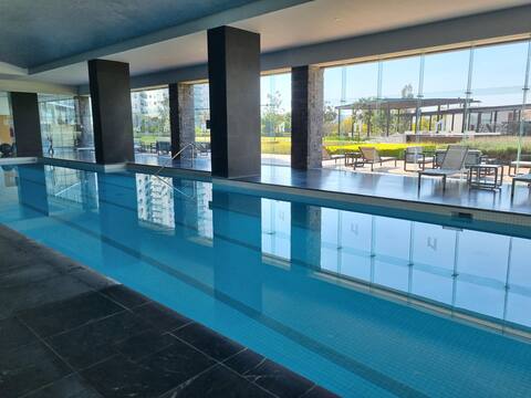 Apartment with a pool and a view of the volcano.