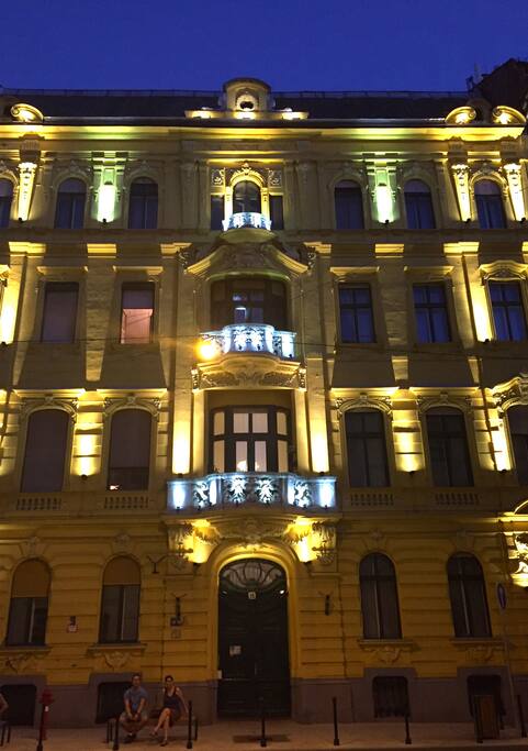 The building, at night.
