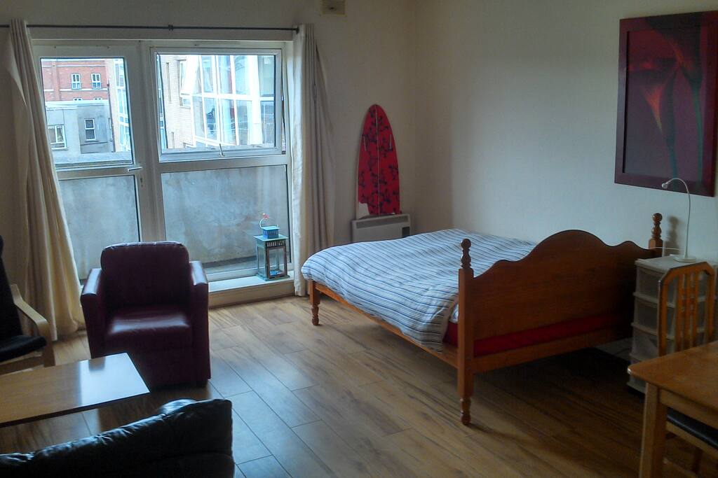 Queen size bed and small terrace