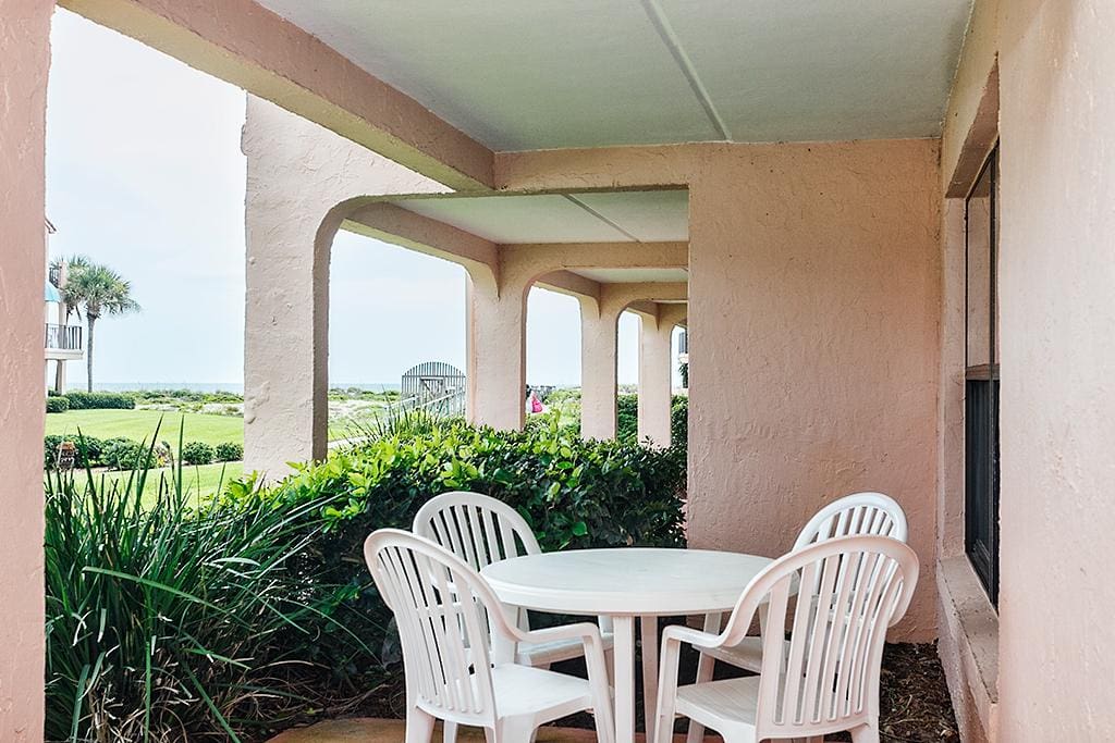 Kick back, relax, and admire the ocean views! - Our ground floor patio is the perfect place to sip your morning coffee and plan h