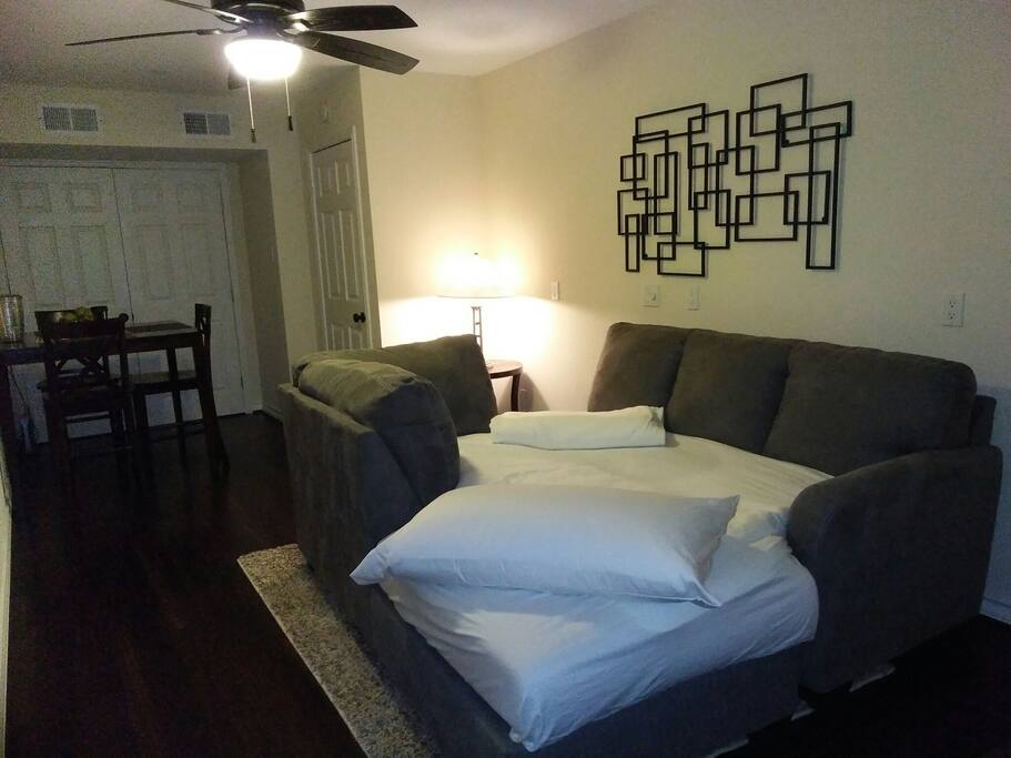 The sectional can be reconfigured to make a very comfortable bed for one.