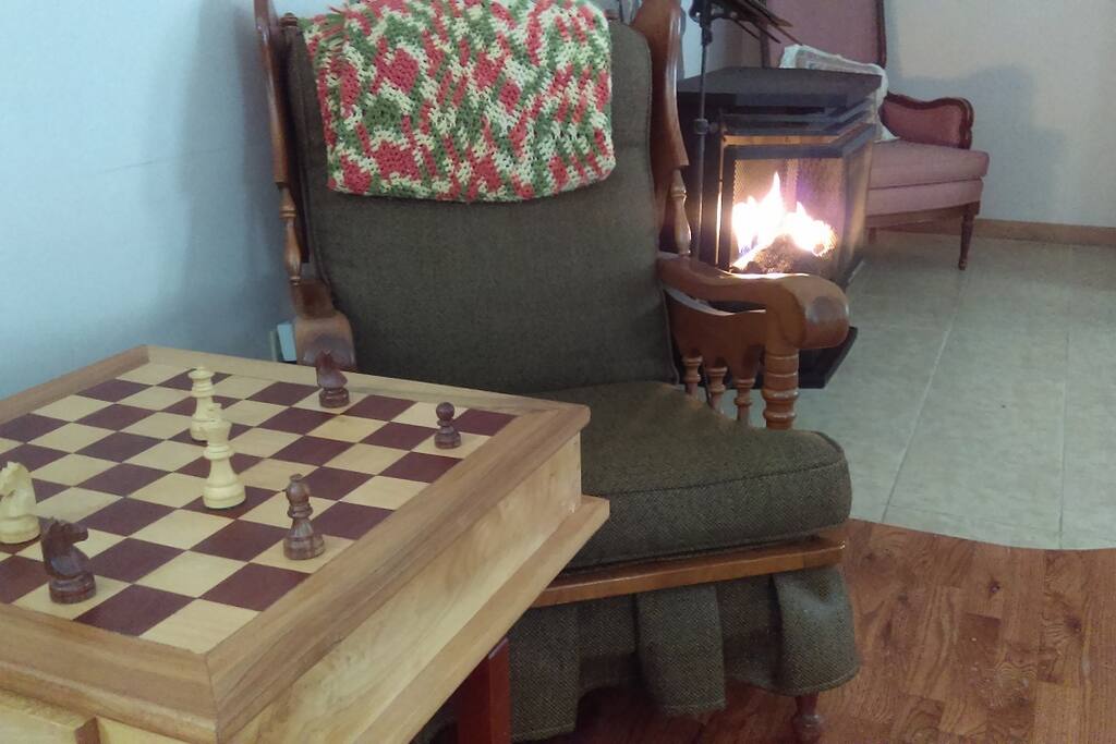 Snuggle up with grannys afghan while playing on our
hand made custom chess board