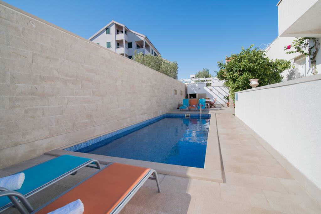 Lovely pool area with sunbeds