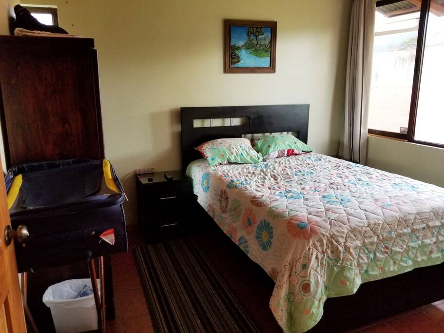 Bedroom 1 - double bed with wardrobe, night table and luggage stand. TV and fan