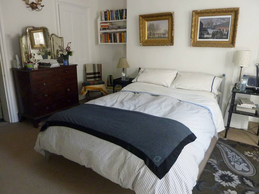 Comfortable bed with fresh linen