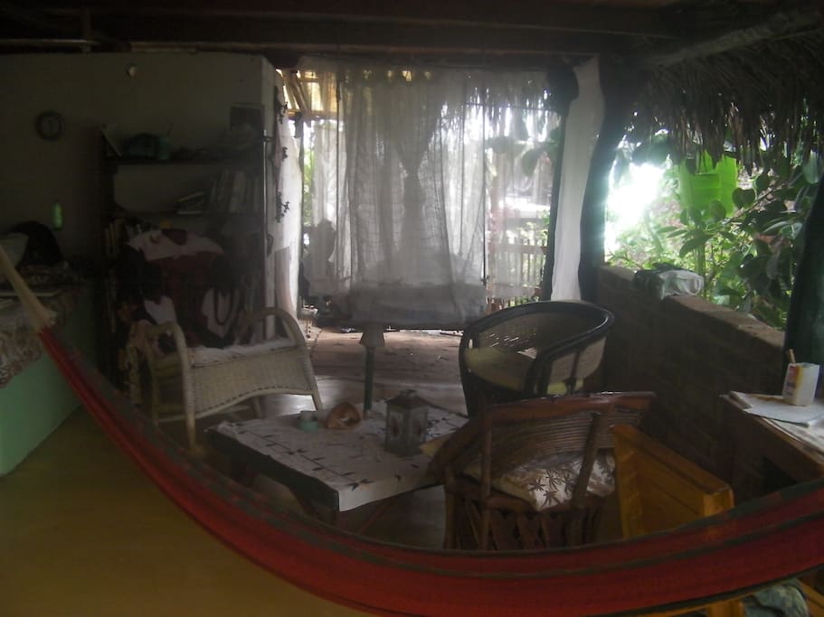 The main living area with "Cuarto Jardin" in the far back with the white curtains!