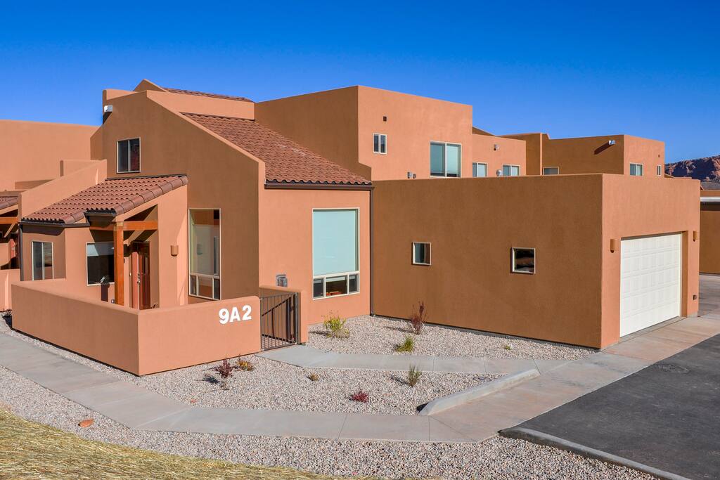 Huge corner end unit, with two car garage and patio