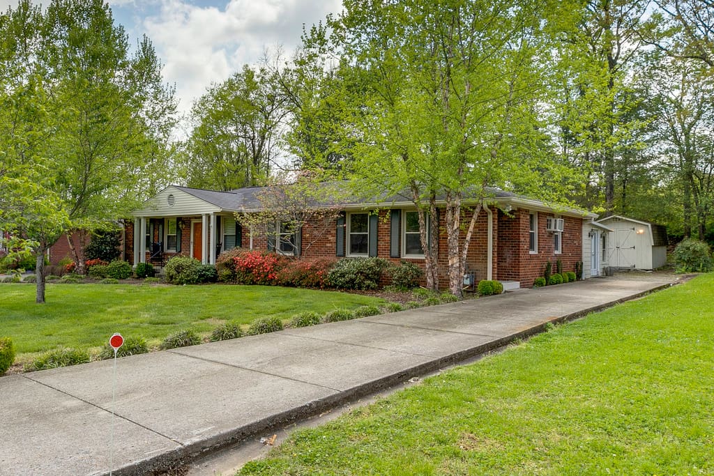 Enter on the right side of the home. Unit B.