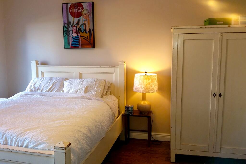 Queen bed in the master bedroom.