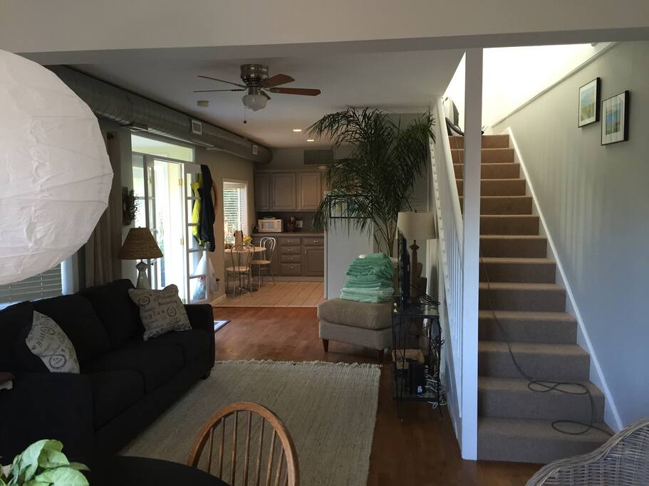 View of Living Room and Stairs leading to Upstairs Bedroom