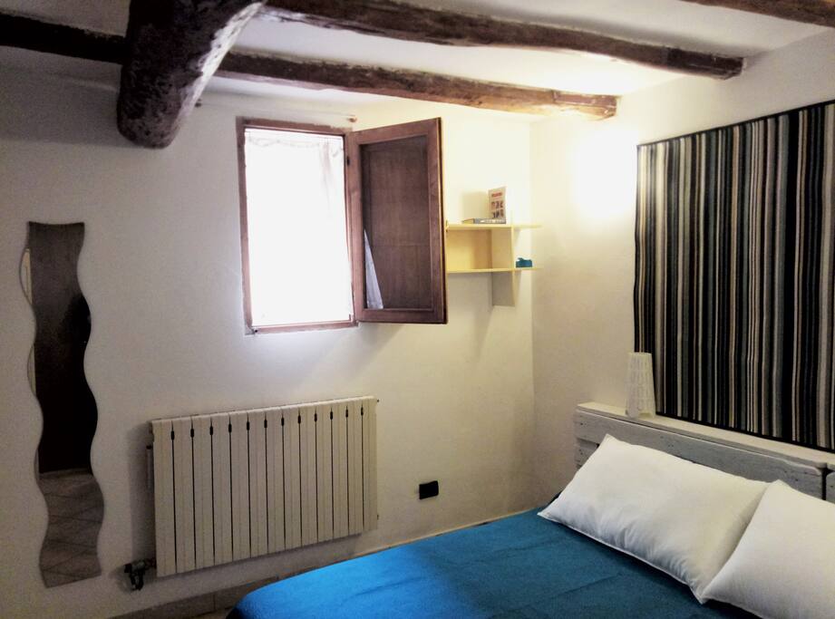 Bedroom 2, window and mirror