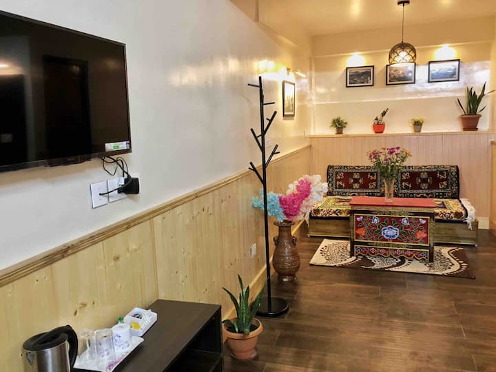 Sala de estar para que los huéspedes charlen mientras disfrutan de una taza de té.