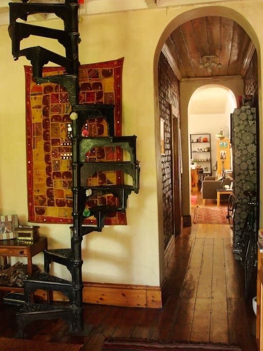 Our foyer with antique stairs to the yoga studio