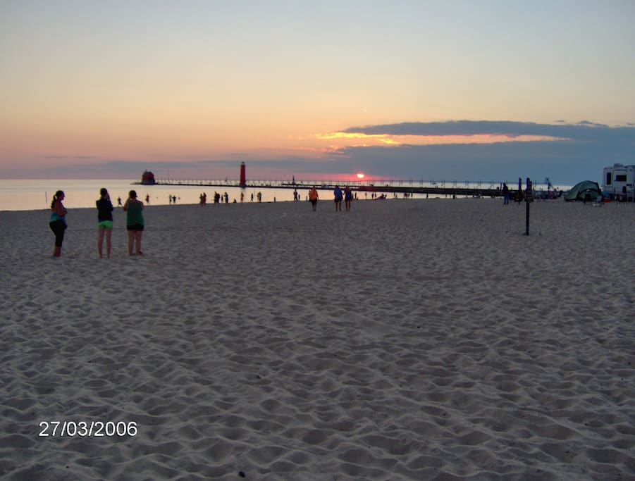Sunset over Grand Haven state park and pier