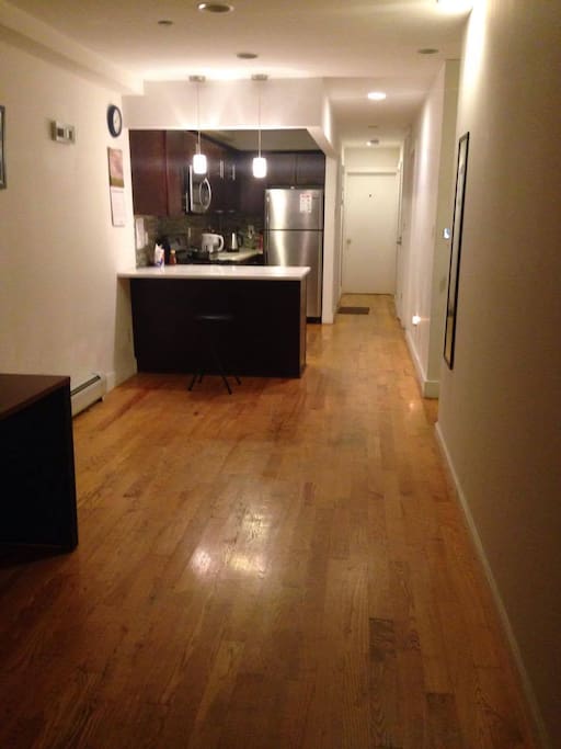 This is the living room shared among all the renters which is spacious clean with extra tables for office work!