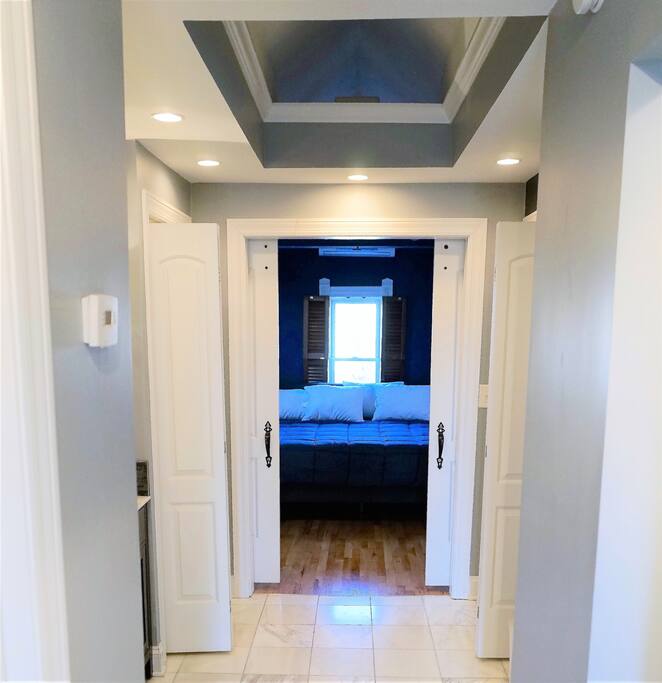 Amazing walkway through the bathroom with custom lighting