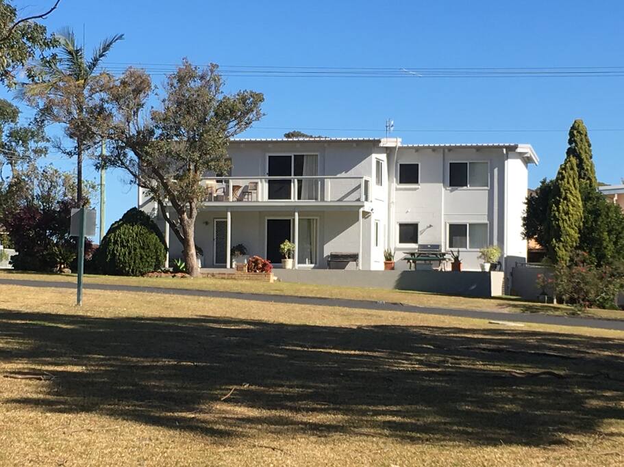Looking at property from reserve. Top level apartment with own fenced backyard.