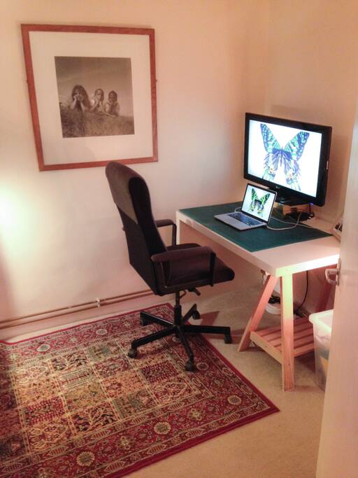 Desk space with large screen.