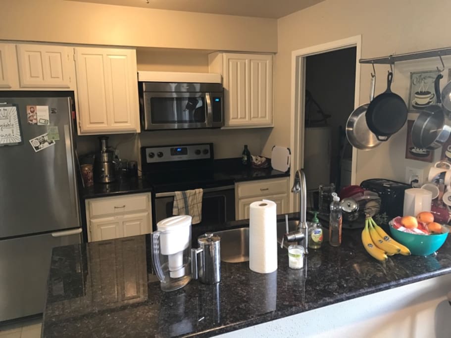 Kitchen amenities include a dishwasher and free laundry