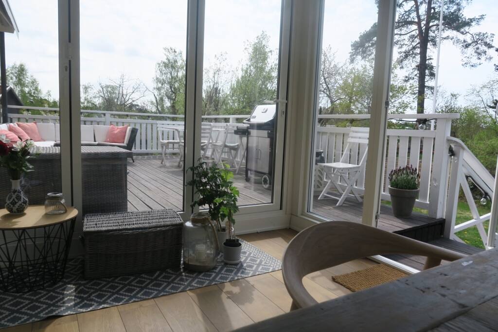 Large terrass next to glass veranda