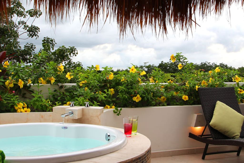 Kick Back and Soak Up the Sun on the Private Roof Top Patio