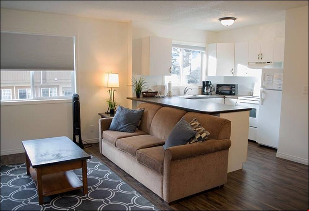 Warm up by the fireplace or entertain at the dining table.
