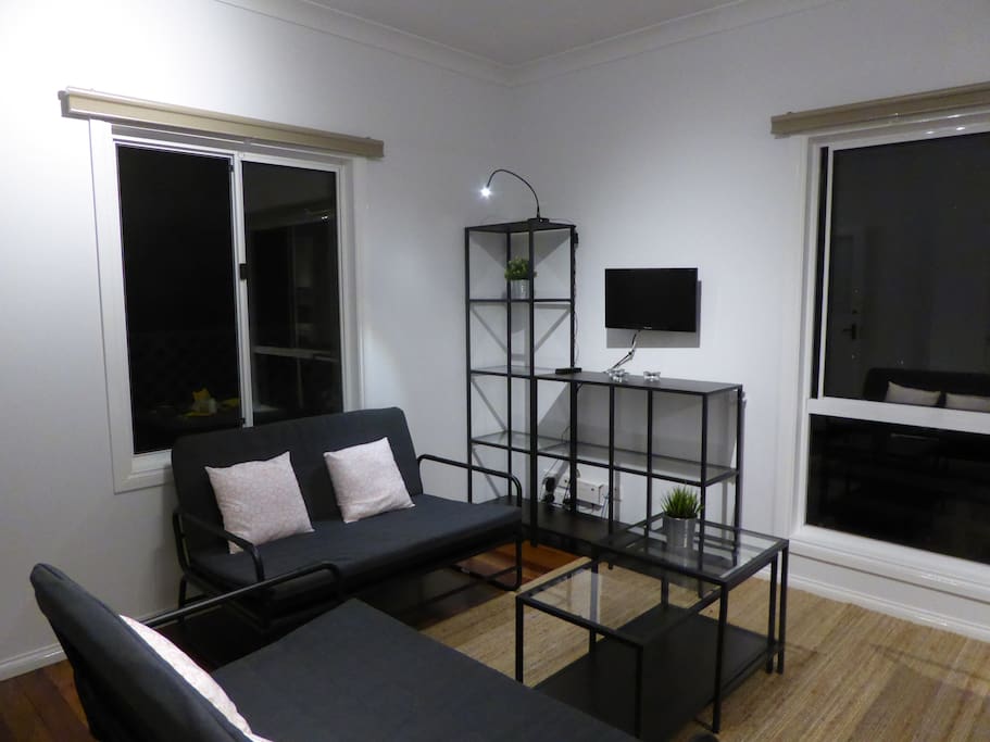 Lounge - three sofa beds and TV with built in DVD player