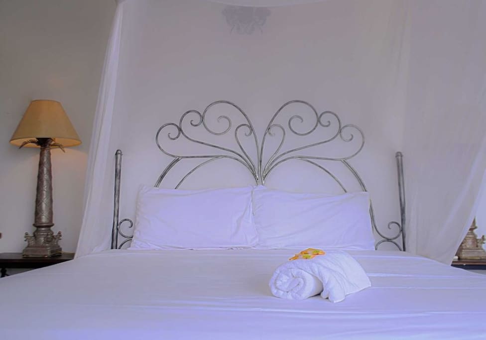 This suite offers a private and intimate experience with it's own terrace and entrance. There a unique open-air bathroom.