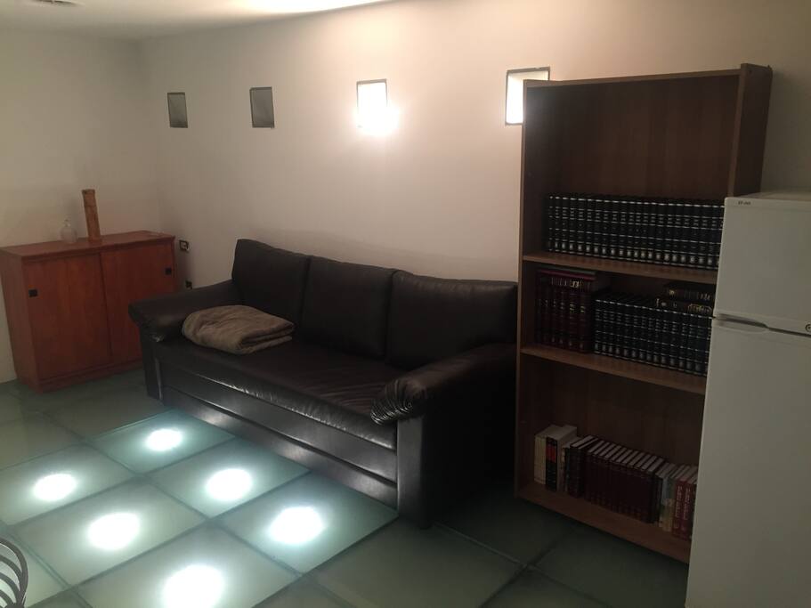 Our unique living room, complete with sub-floor lighting!