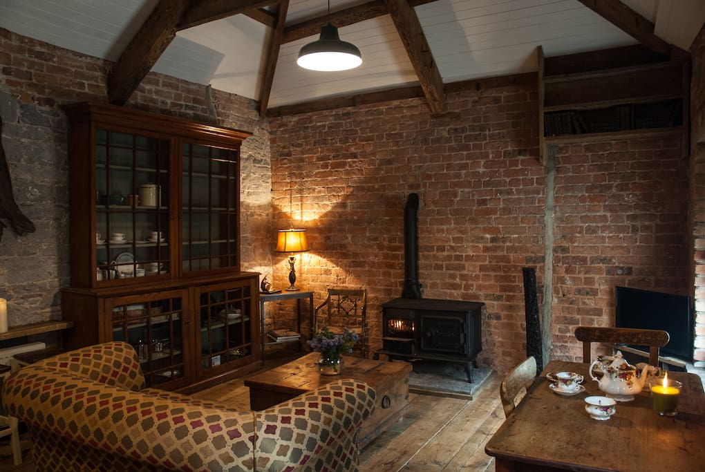 Living room with wood burning stove , wifi and satellite tv in peaceful serene surroundings