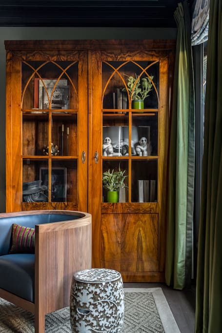 Seating area & antique biedermeier cabinet in second floor library