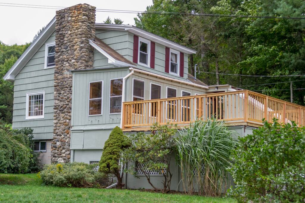 The house, with parking for several cars (including one covered spot)