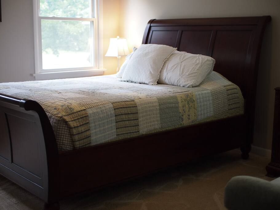 the queen room ensuite with a queen bed