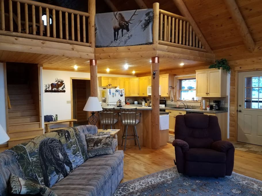 Great room, kitchen, and view toward loft
