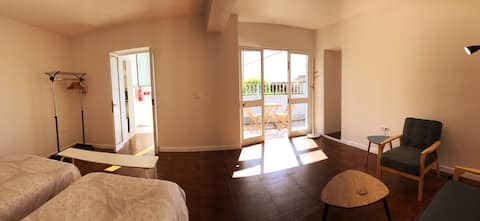 Top performing Airbnb: Machico apartment with patio - 5 min walk to beach in Machico