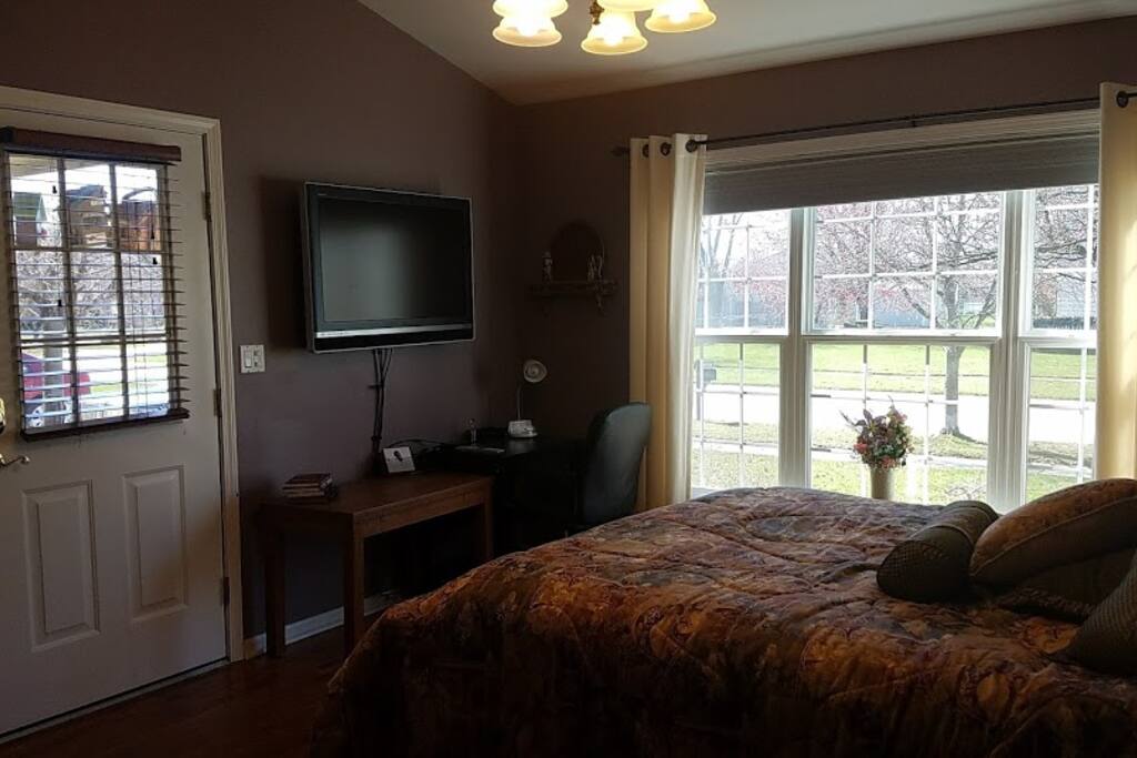 Plenty of natural light. Enjoy free cable and internet on the 45 in TV. Locked interior door to house. No access either way.