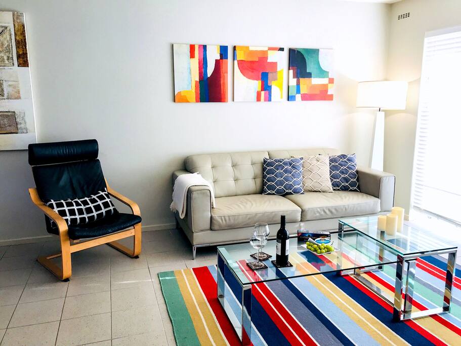 New Leather Sofa, rug and Coffee Table in lounge area