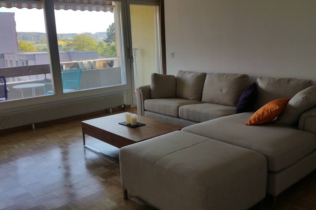 Living room couch looking out to the balcony