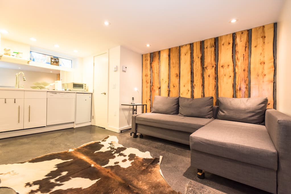 Full kitchenette with beer fridge right beside the couch!