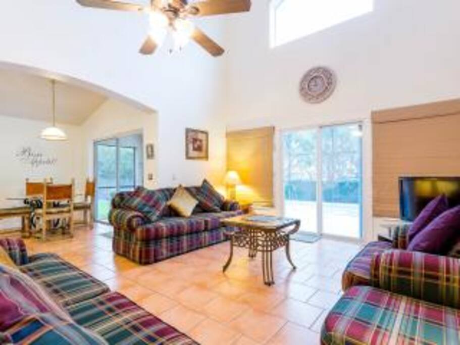 great living room overlooking pool and deck