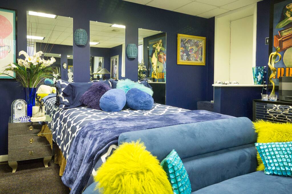 Your Private Bedroom with Library , Desk , Sofas and a Bar Cart . This is Your own Private Floor . Just One Big Room .